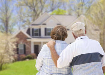Elderly Couple Looking at Their House KithCare